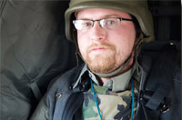 Jon Vidar in a blackhawk in Iraq