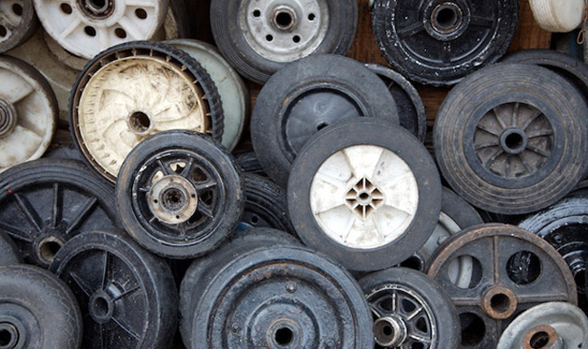 A collection of wheels sit on the roadside in Manaus, Brasil