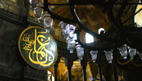 Lamps hang inside the Hagia Sophia in Istanbul, Turkey